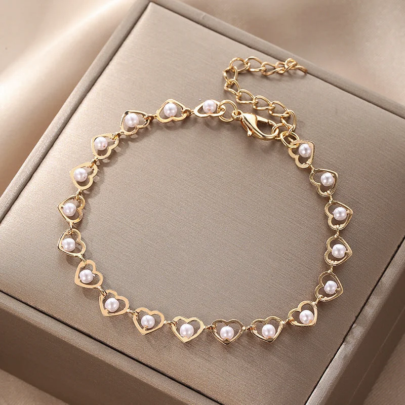 jsz131-6-hb-Environmentally Friendly Hollow Love Pearl Bracelet